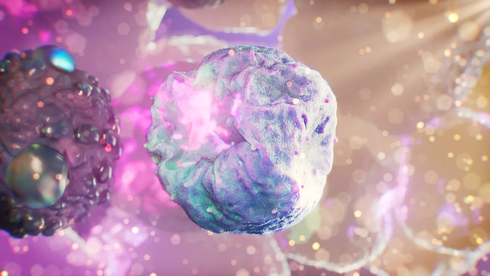 Translucent cells suspended in a luminous pink and gold microscopic environment